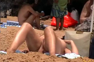 Naturist dame in her daily life in beach